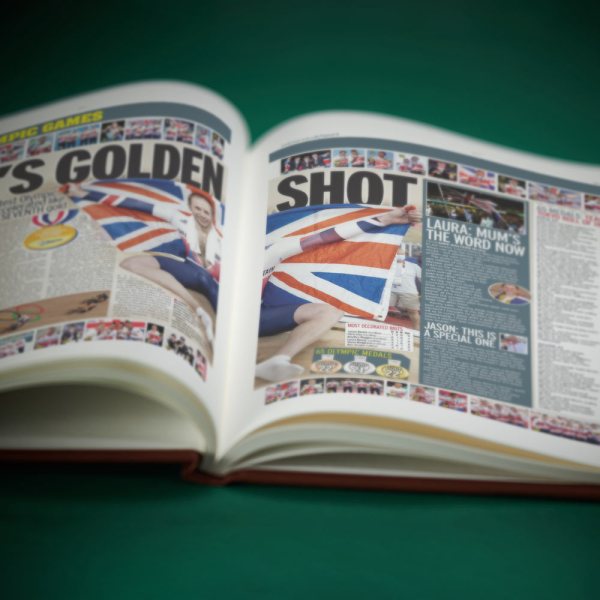 Olympics newspaper history book